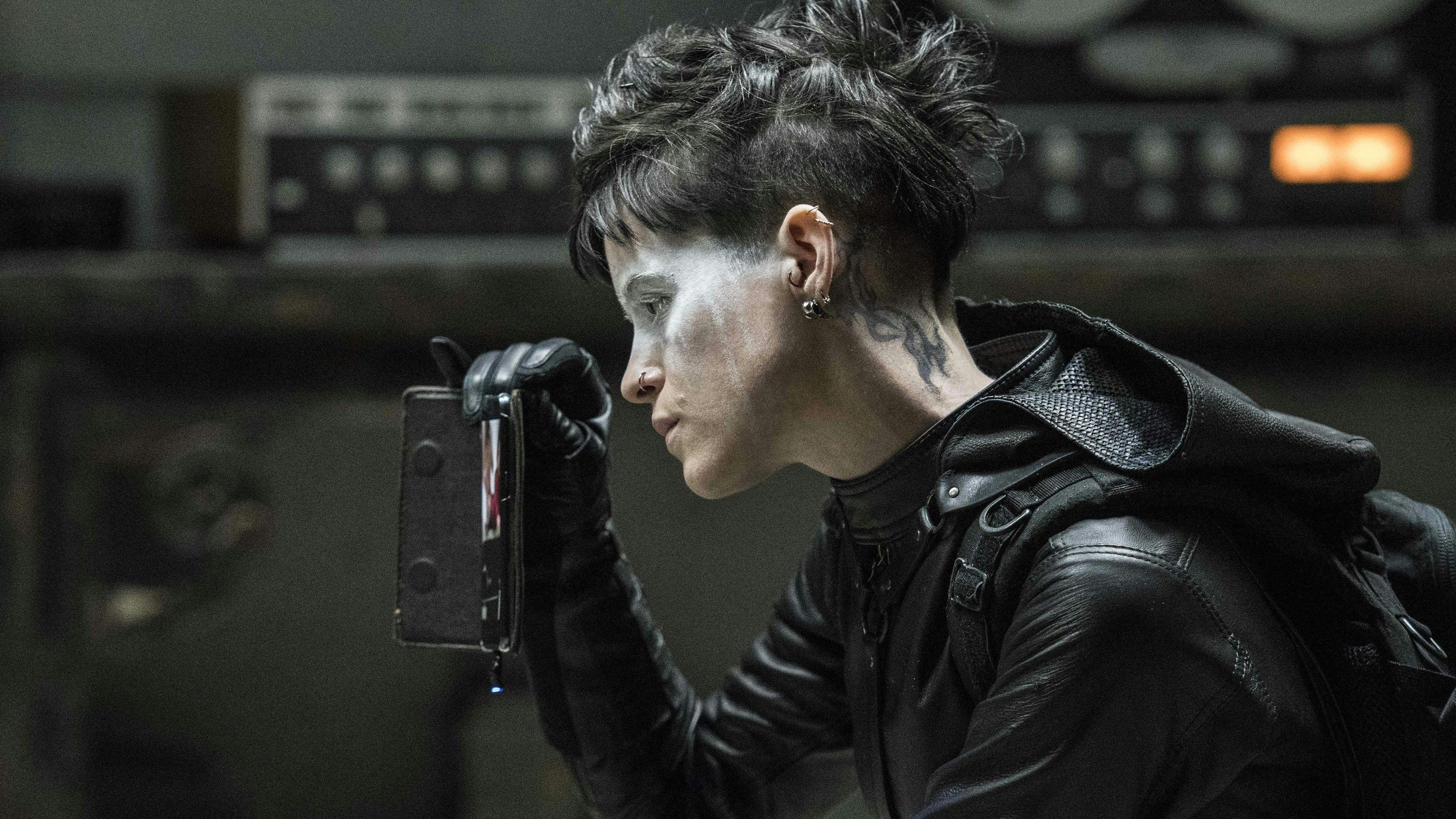 Millennium: A Garota na Teia de Aranha backdrop