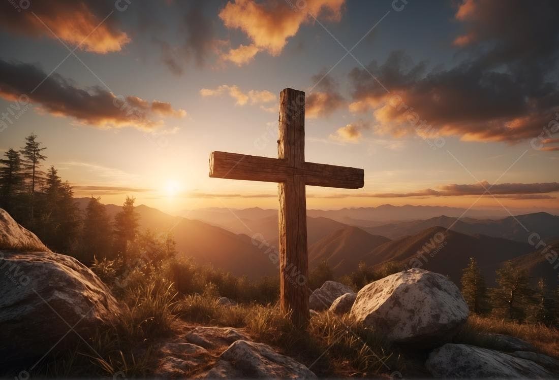 Cruz de madeira ao pôr do sol montanhoso