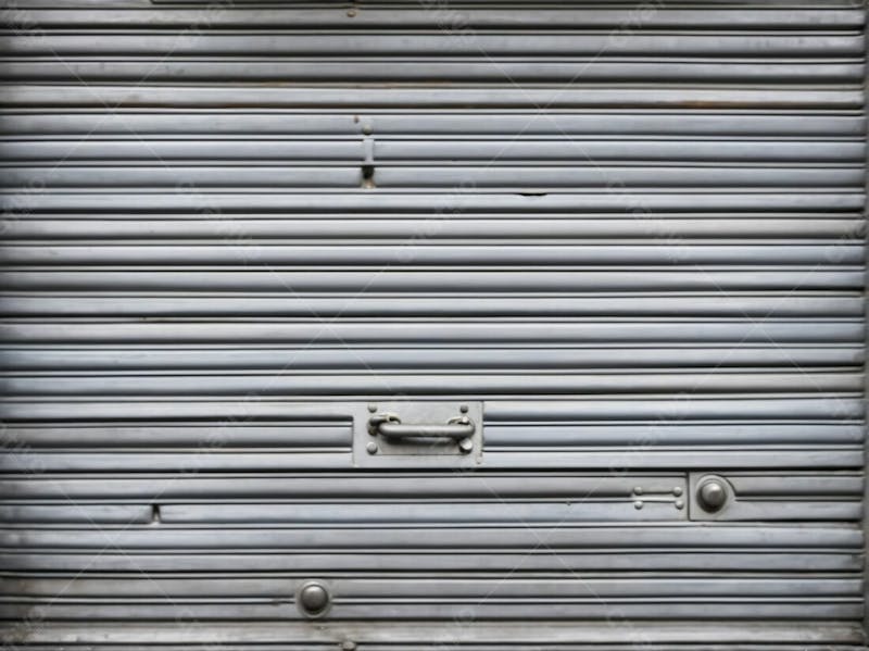 Textura de porta de ferro da loja realista cinza