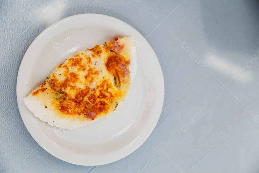 Tapioca com queijo e presunto gratinado