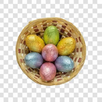 Uma cesta com ovos de páscoa coloridos png transparente