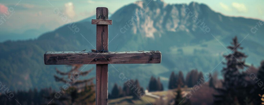 Cruz de madeira em paisagem montanhosa