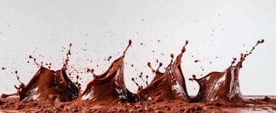 Calda De Chocolate Em Forma De Splash No Ar 35