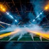 Modernized football stadium filled with smoke and lit by lights