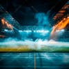 Modernized soccer stadium, smoke filled, lit up by lights