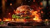 Complete burger, on top of a board with sparks background