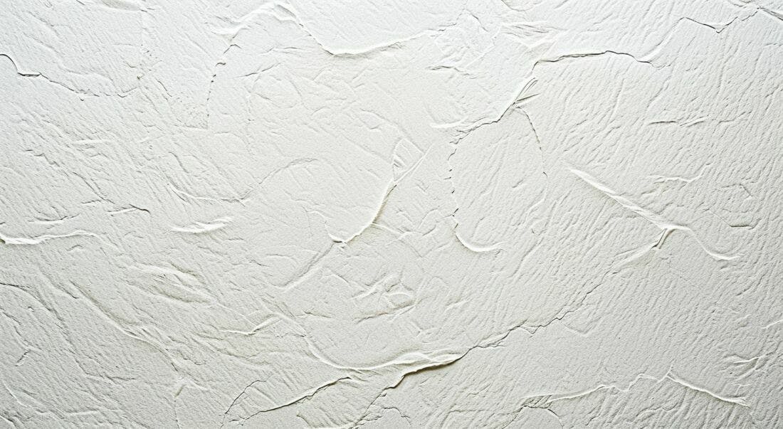 Textura de Parede Branca em Relevo