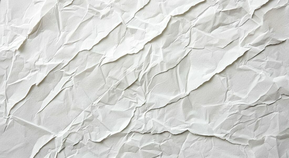 Papel amassado textura branco