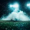 Football field at night with fog and dust