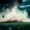 Soccer field at night with fog and dust