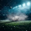 Soccer field at night with fog and dust