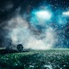 Soccer field at night with fog and dust