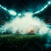 Soccer field at night with fog and dust