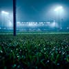 Soccer field full of fog and dust particles