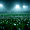 Football field filled with fog and dust particles.