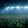 Soccer field full of fog and dust particles