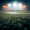 Soccer field full of fog and dust particles