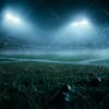 Soccer field filled with fog and dust particles.