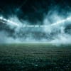 Soccer field filled with fog and dust particles