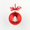 Christmas ornament, red ball on white background