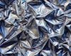 Texture of crushed aluminum foil with metallic shine