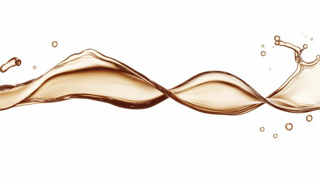 Ondas de líquido âmbar sobre fundo branco