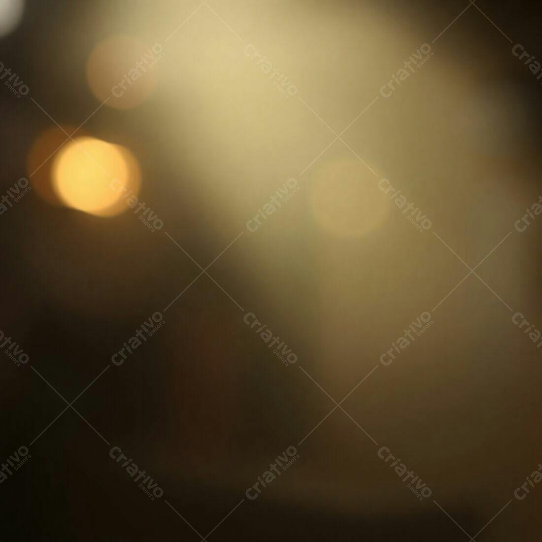 Bokeh dourado e marrom escuro