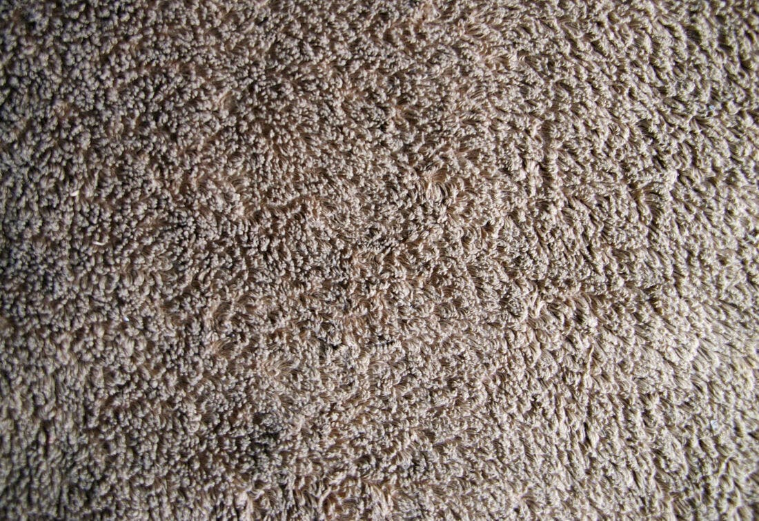 Textura de tecido marrom claro felpudo