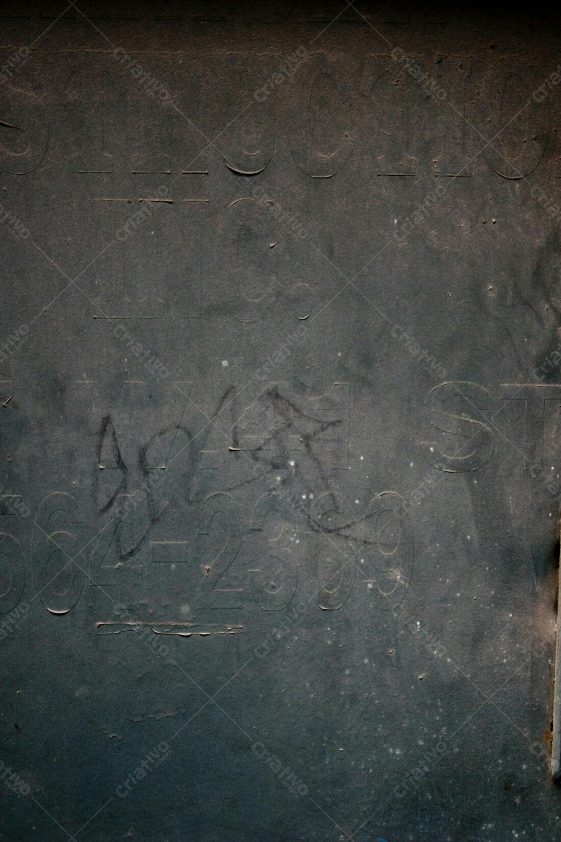 Textura de parede cinza com grafite