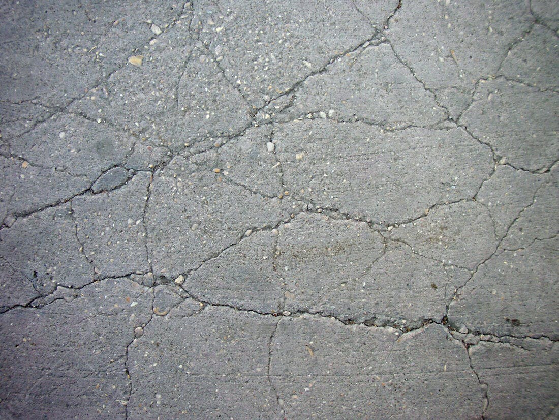 Textura de concreto rachado cinza
