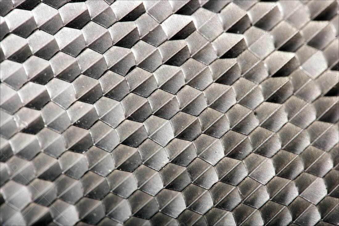Textura metálica hexagonal cinza escuro