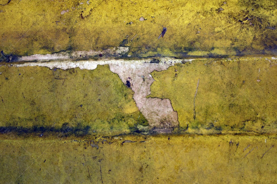 Textura de tinta amarela descascada