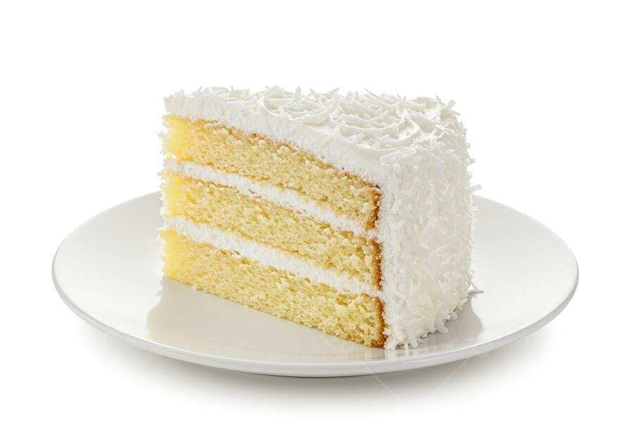 Fatia de bolo de baunilha com coco