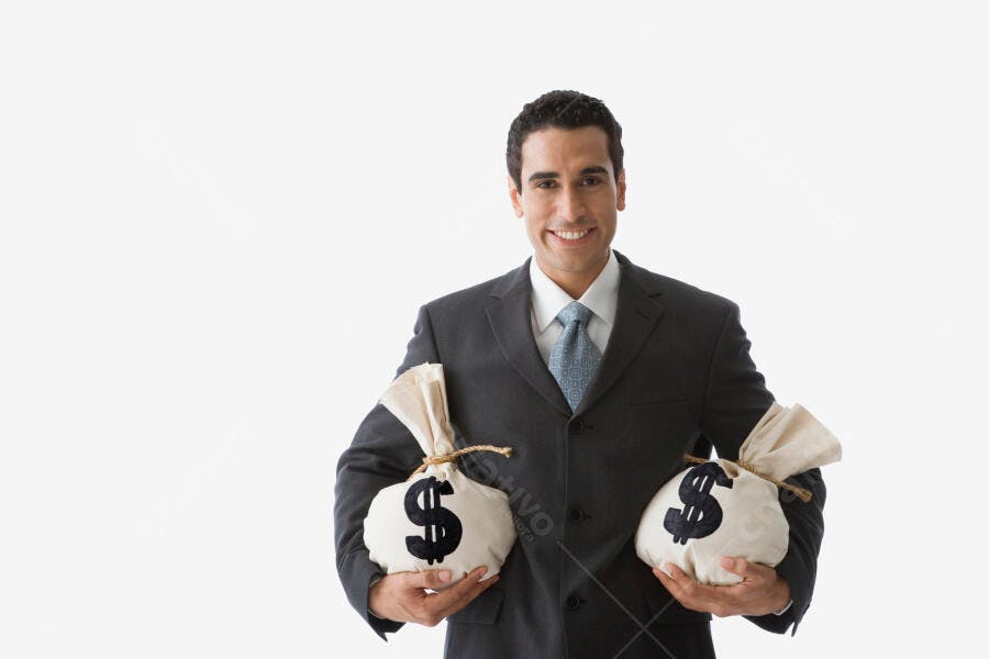 Homem de Negócios com Sacos de Dinheiro