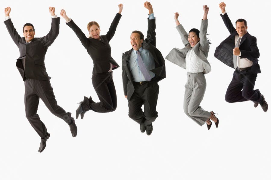 Equipe de negócios pulando de alegria