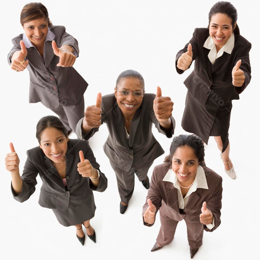 Mulheres executivas mostrando positivo