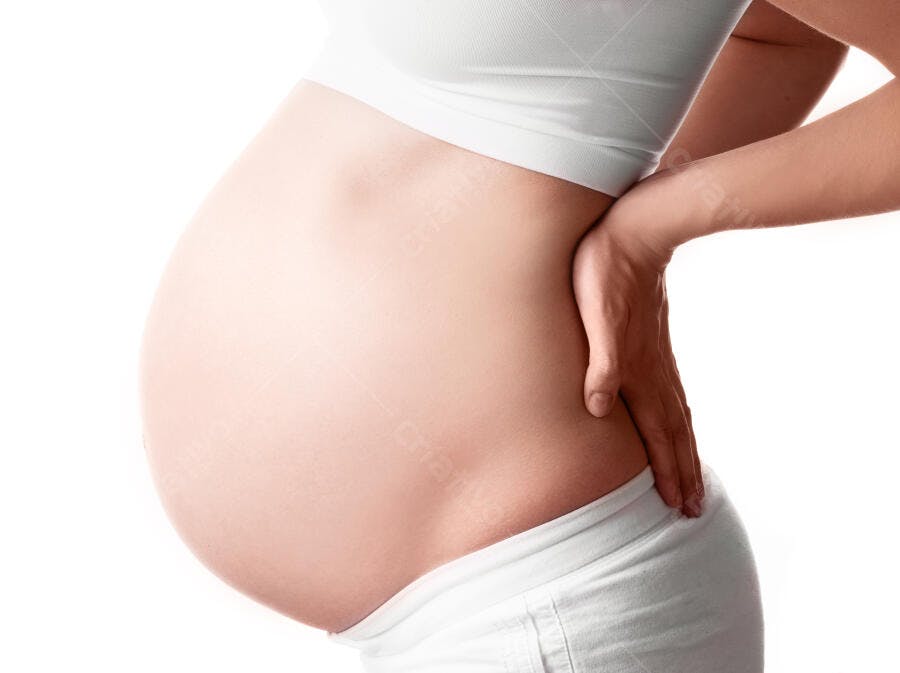 Barriga de grávida com dor lombar