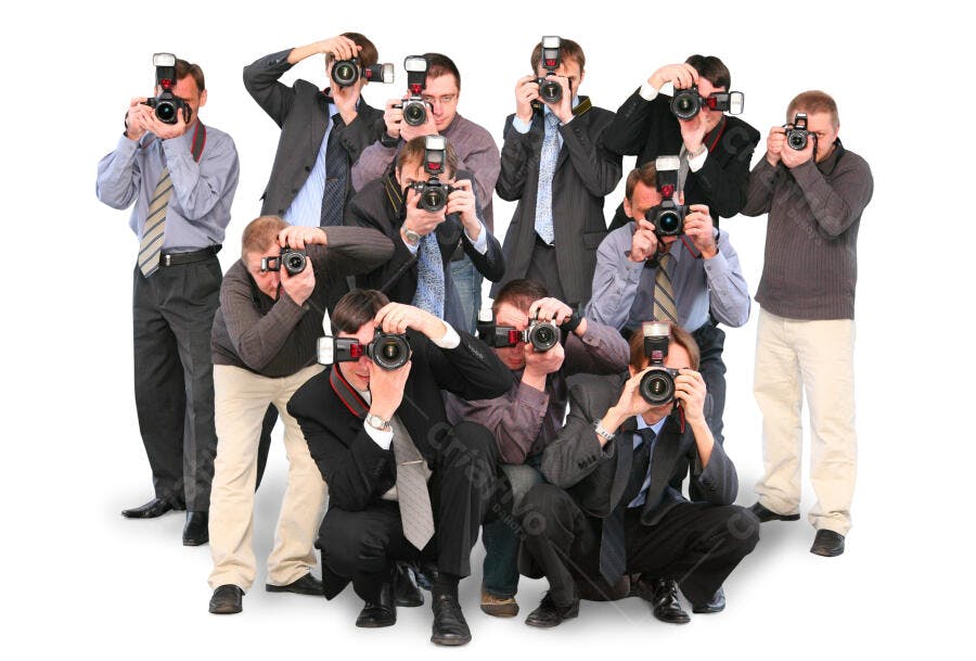 Fotógrafos em grupo com câmeras DSLR