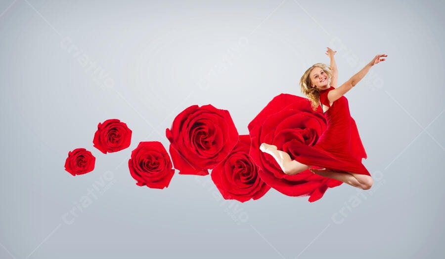 Bailarina em vestido vermelho saltando entre rosas