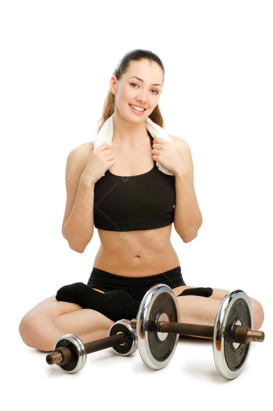Mulher fitness sorrindo com halteres