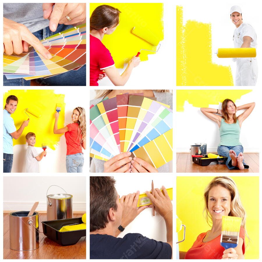 Família pintando parede amarela com rolos