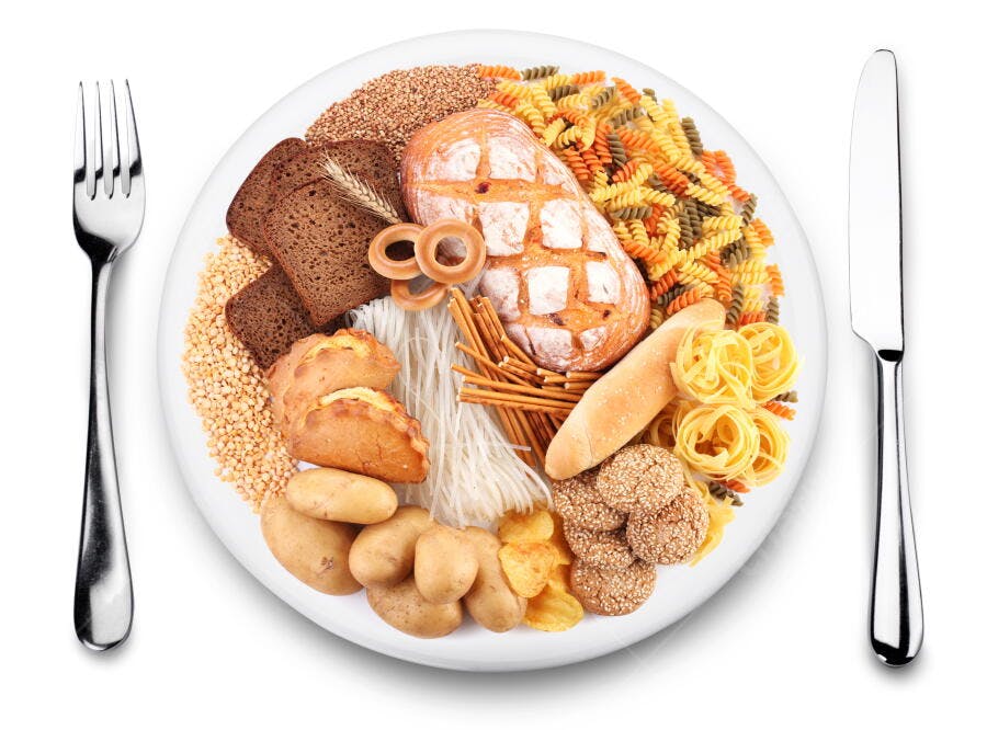Prato de Carboidratos variedade de pães massas e grãos