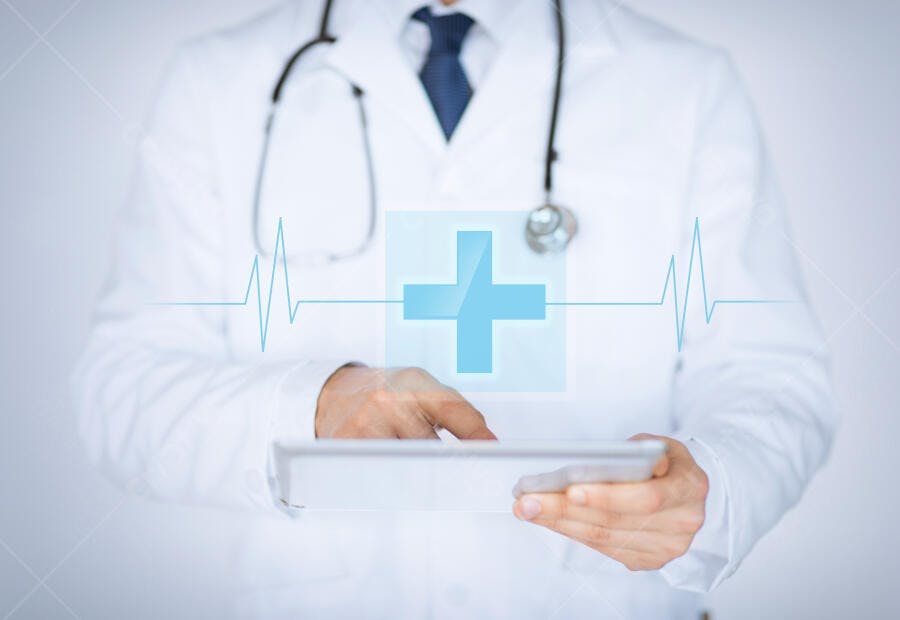 Médico usando tablet com símbolo médico
