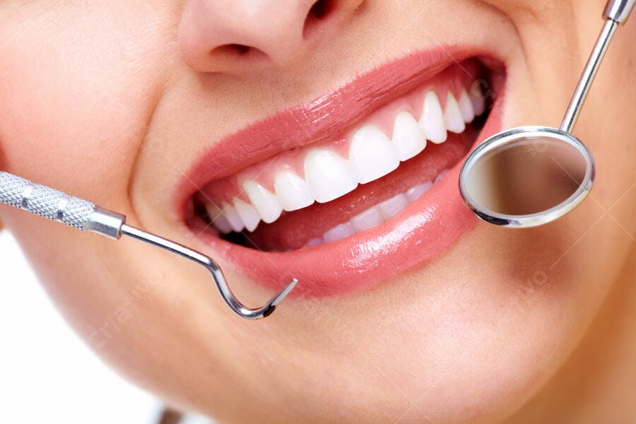 Sorriso Saudável e Dentes Brancos Consultório Odontológico