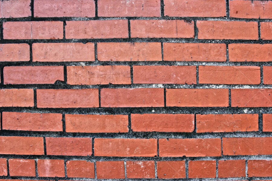 Parede de tijolos vermelhos textura rústica