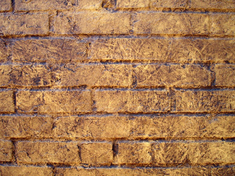 Parede de tijolos marrom dourado texturada