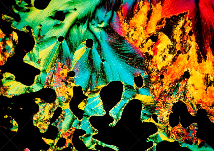 Cristais coloridos microscópicos fundo preto