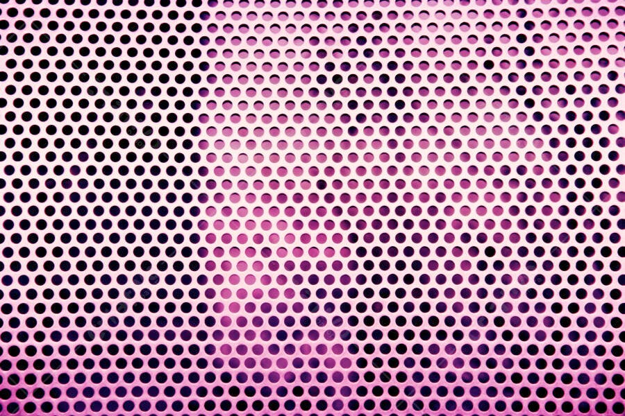 Metal perfurado rosa textura fundo