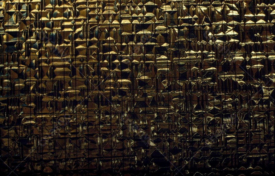 Textura dourada em relevo geométrico