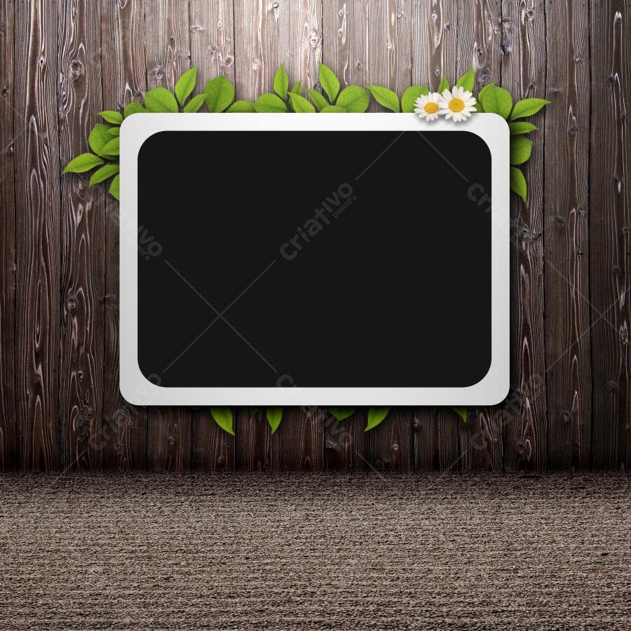 Quadro negro decorado com folhas e flores em fundo de madeira